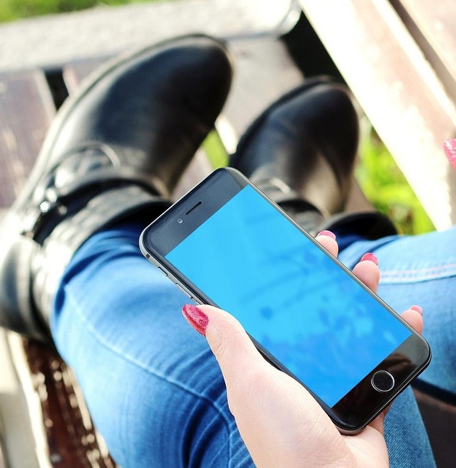 Modern black smartphone on gradient background